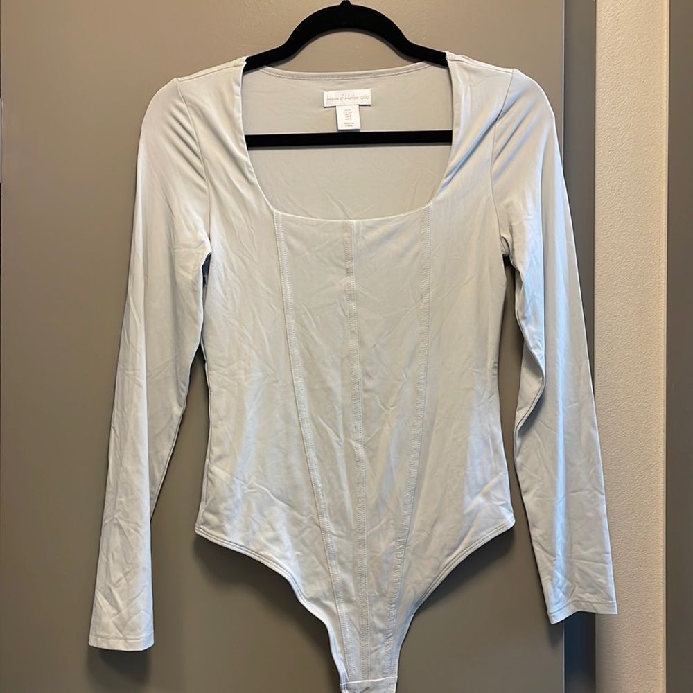 Light blue body suit